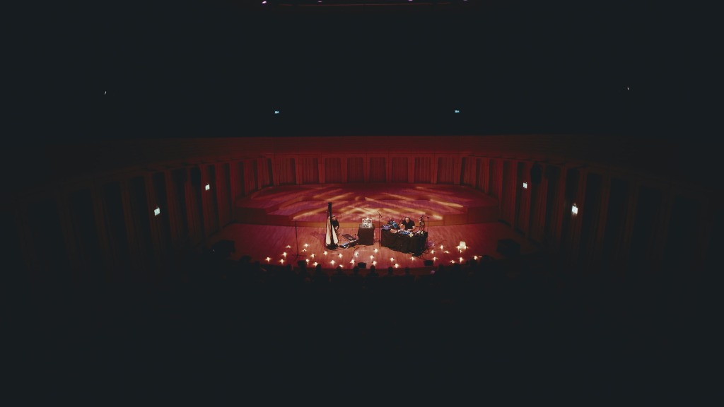 Satoru live — the debut performance, lit by candlelight